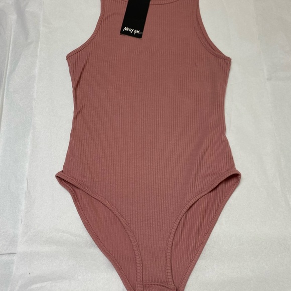Nasty Gal Tops - NWT: Nasty Gal Ribbed Snap on Body Suit
Nasty Gal